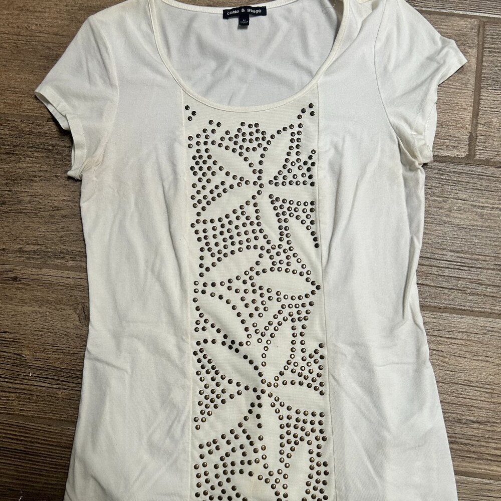 Cream color top with bass tabs